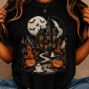 Women’s Plus Size Haunted House Graphic T-Shirt, Ghost Pumpkin Bat Moon Print Cotton Short Sleeve Tee, Casual Loose Fit Halloween Top